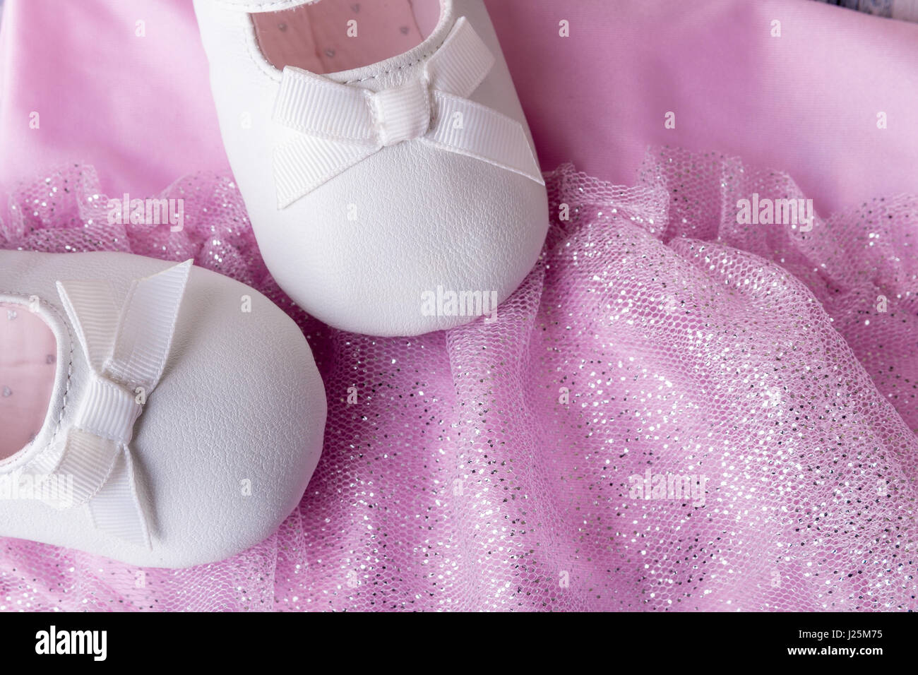 Baby girl white dancing shoes near leotards Stock Photo Alamy
