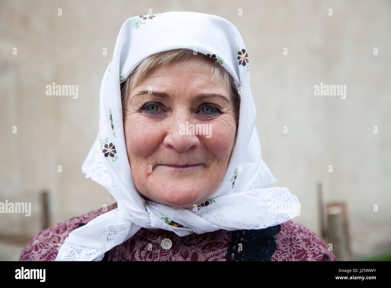 Portrait of a traditional woman from the Moravian region of Czech Republic wearing a typical head scarf Stock Photo