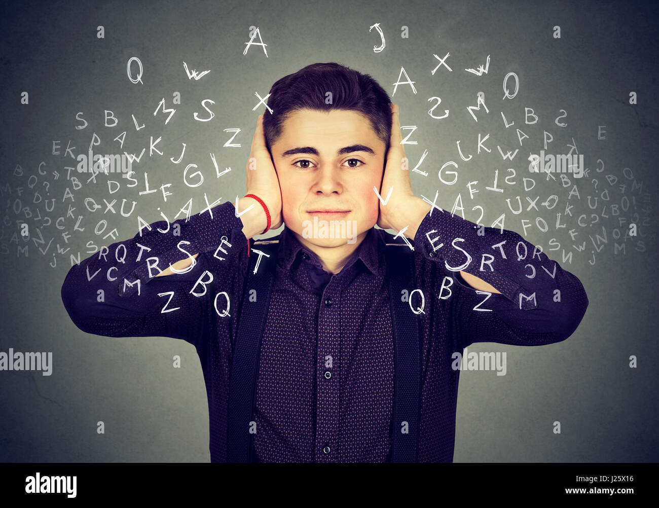 Man covering ears with hands doesn't want to listen to loud