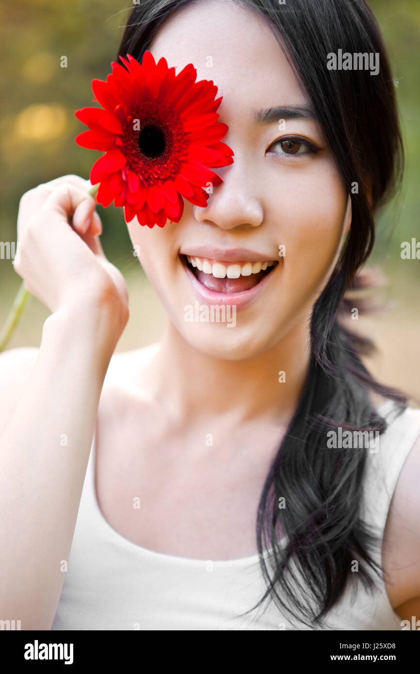 A portrait of a beautiful asian woman outdoor Stock Photo - Alamy