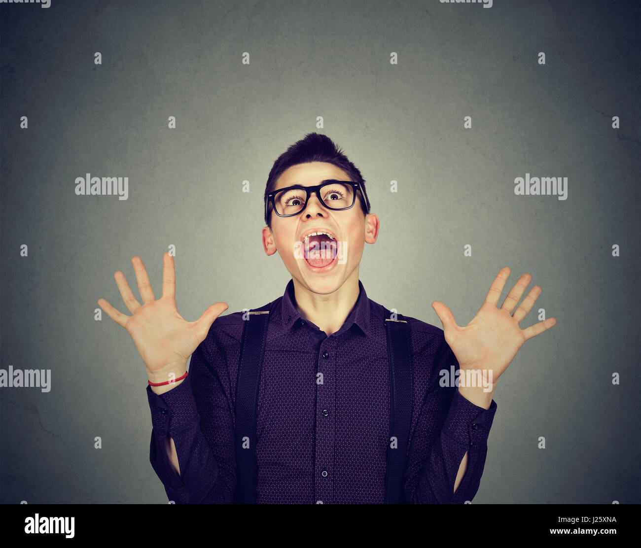 Surprised excited funky looking man screaming Stock Photo - Alamy