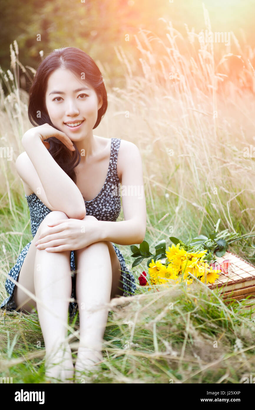 A portrait of a beautiful asian woman outdoor Stock Photo - Alamy
