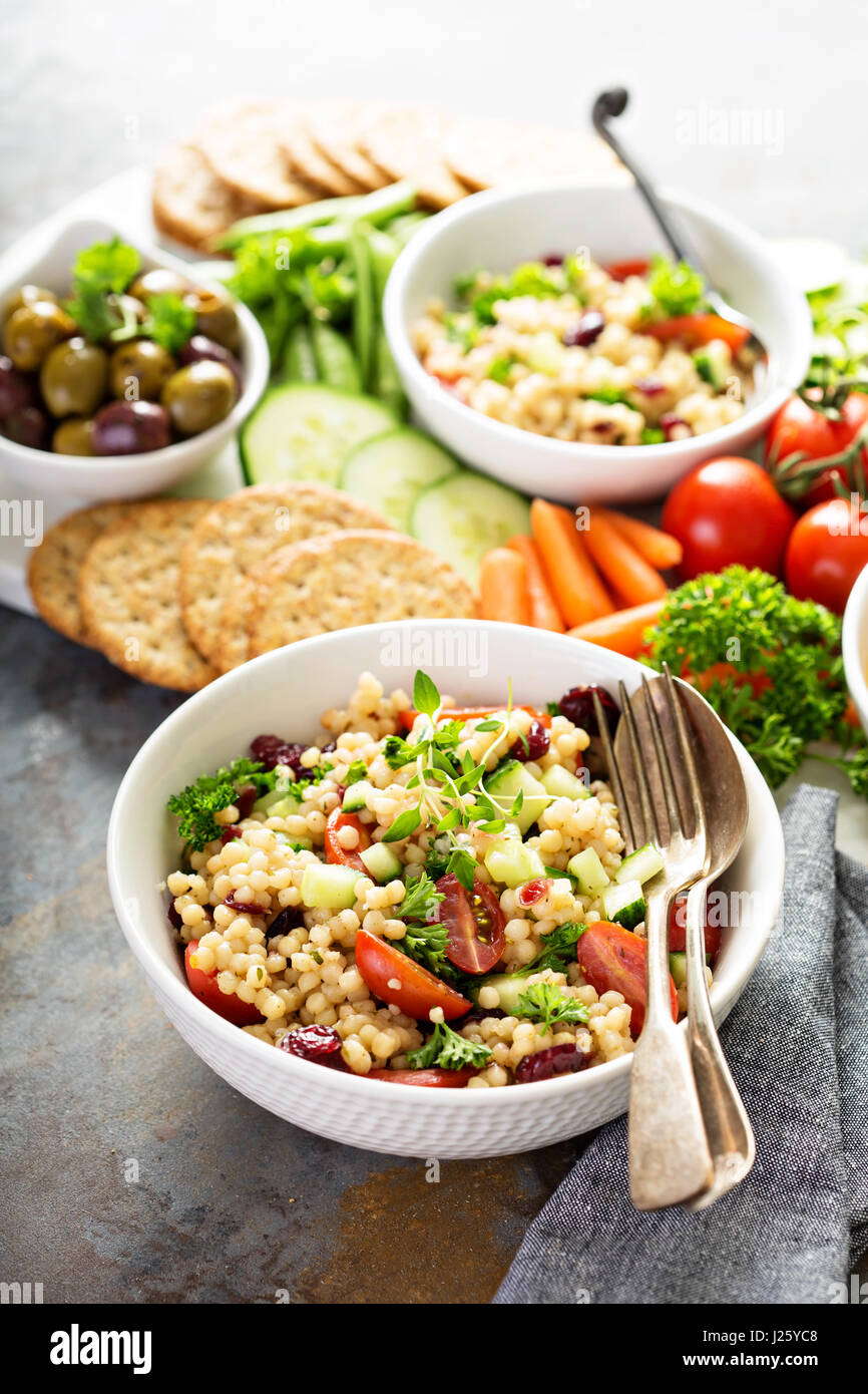 Pearl couscous salad with fresh vegetables and herbs Stock Photo Alamy