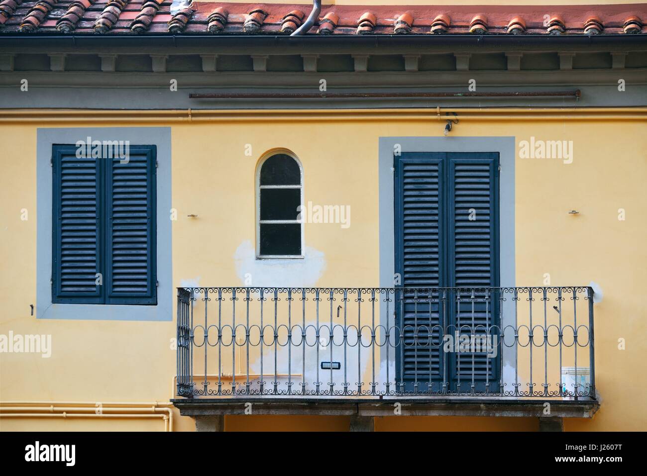 Balcony with decoration in Medieval Town Lucca in Italy. Stock Photo