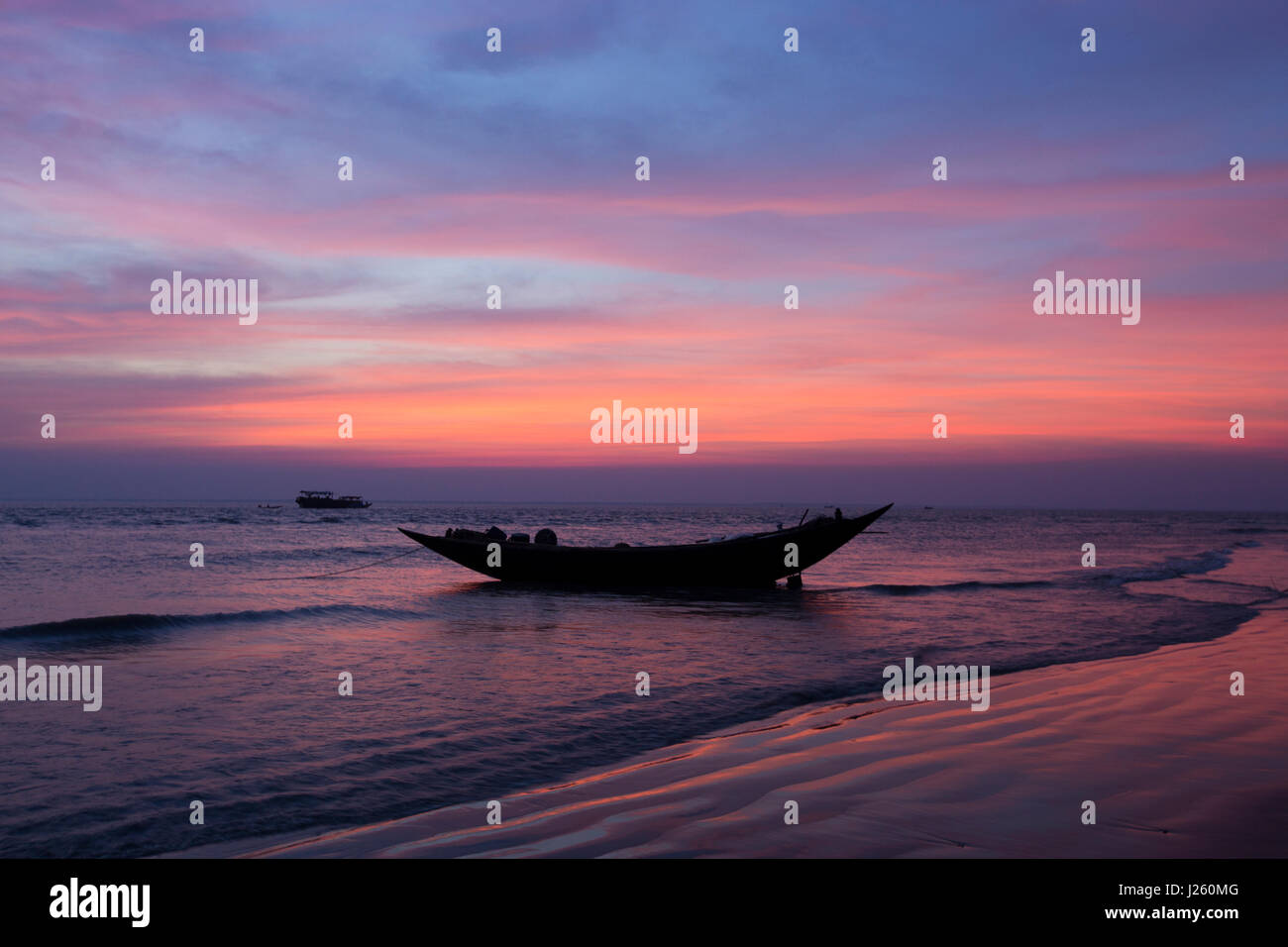 A fishing boat on the Bay of Bengal at Dublarchar in the Eastern Division of Sundarbans forest. Bagerhat, Bangladesh. Stock Photo