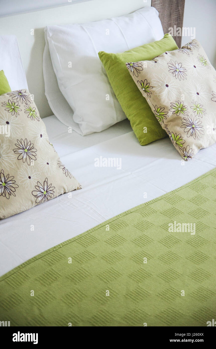 Colorful Pillows on Made Bed Stock Photo Alamy