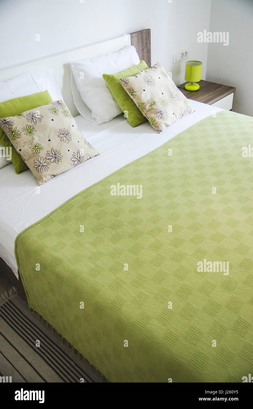 Colorful Pillows on Made Bed Stock Photo Alamy