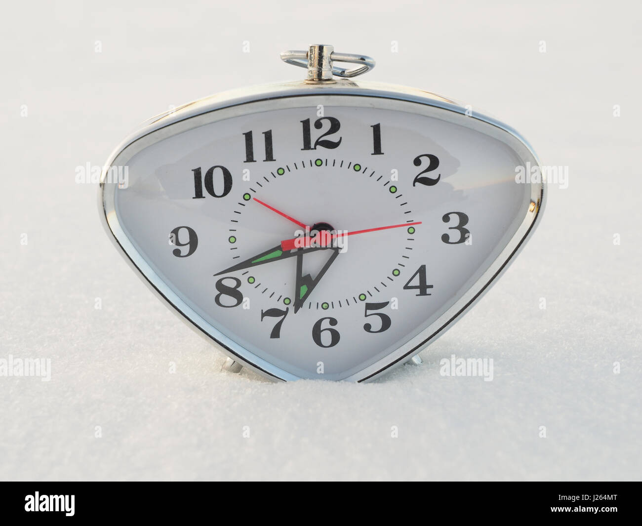clock in the snow Stock Photo Alamy