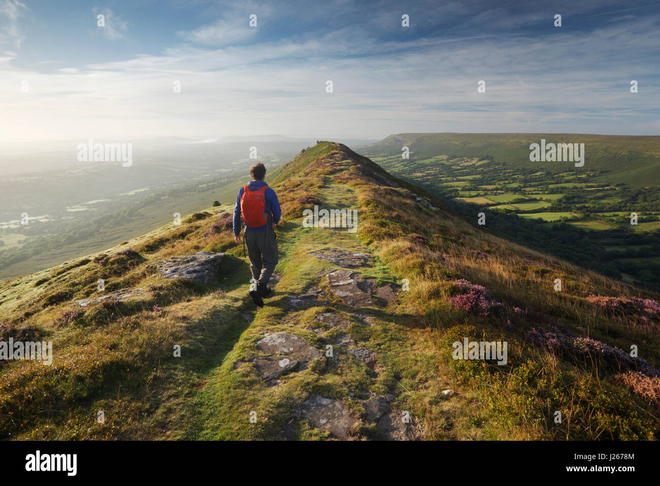 Hillwalker on Black Hill in the Black Mountains. Brecon Beacons National Park, Wales, UK. Stock Photo