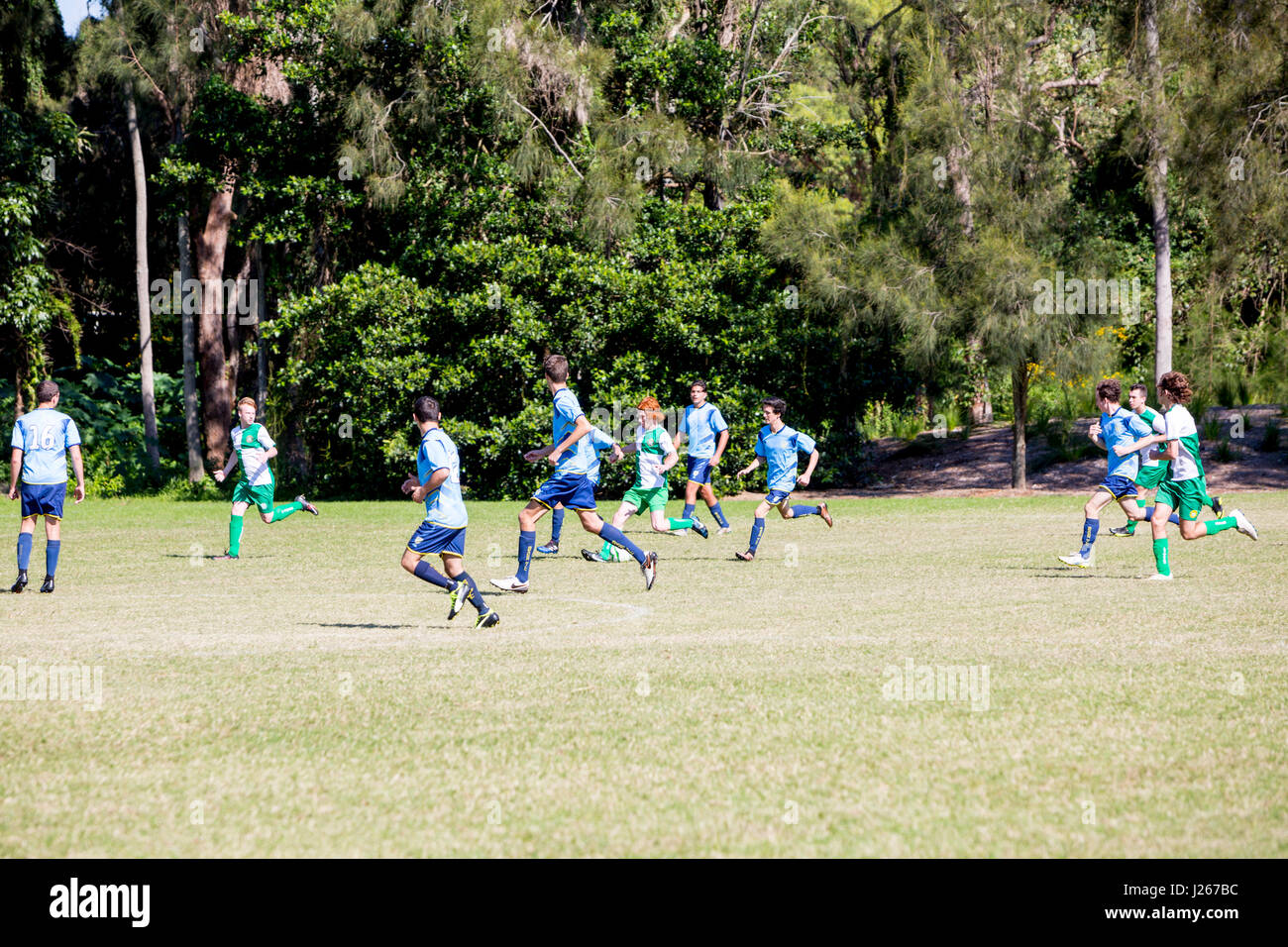 Mens football soccer game being played in Sydney Australia, part of the