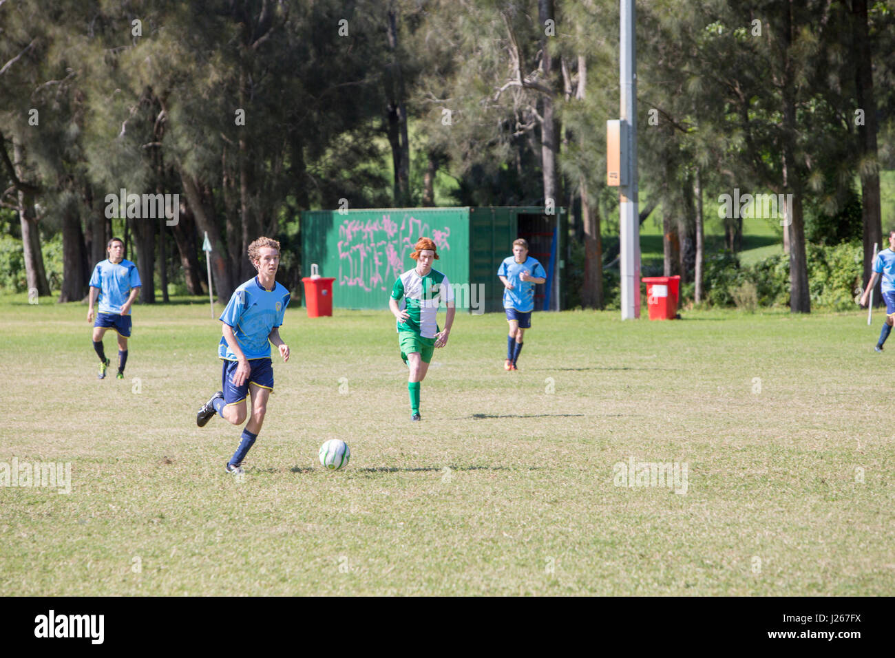 Mens football soccer game being played in Sydney Australia, part of the