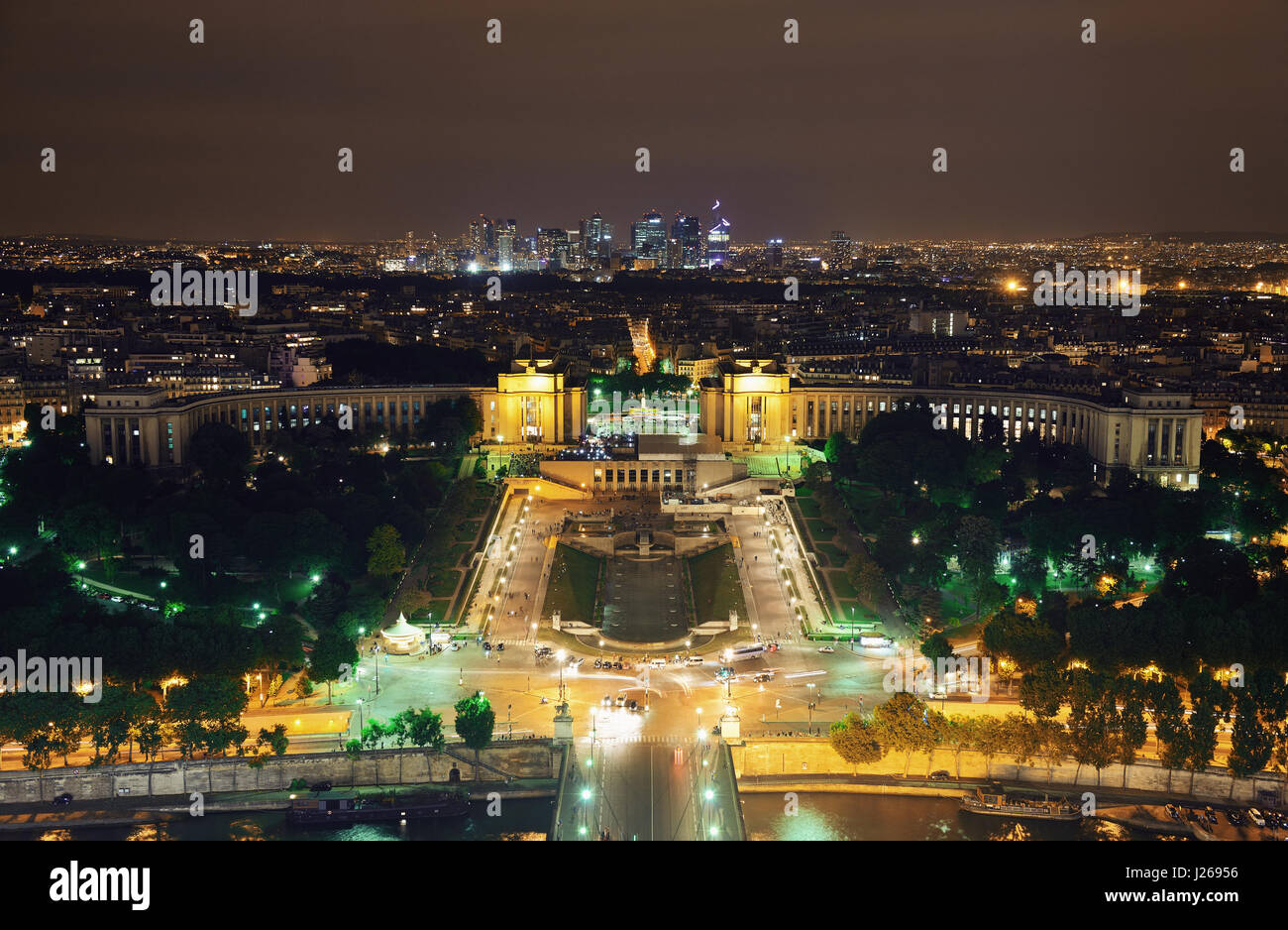Paris city skyline rooftop view with la Defense at night, France. Stock Photo