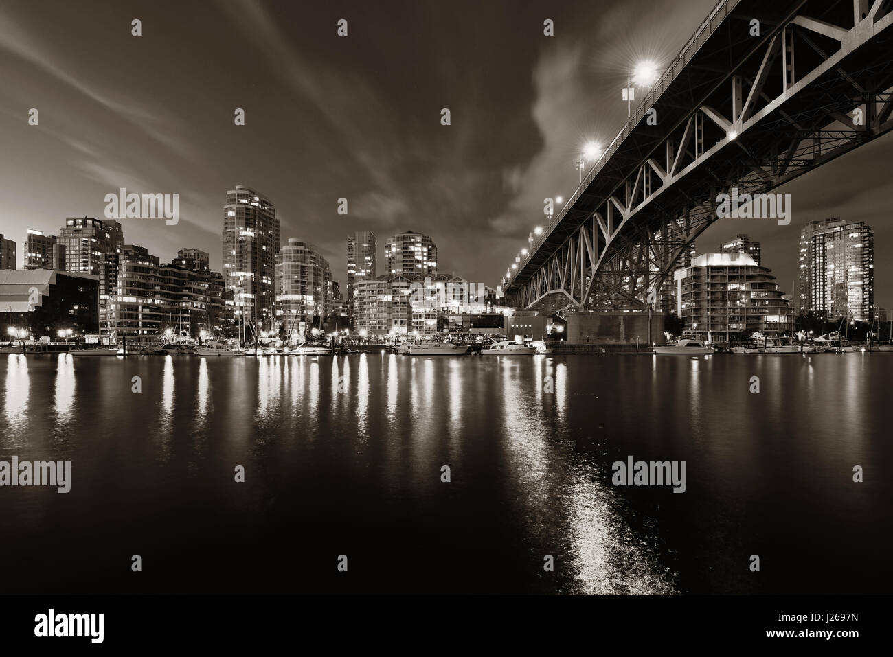 Vancouver False Creek at night with bridge and boat Stock Photo - Alamy