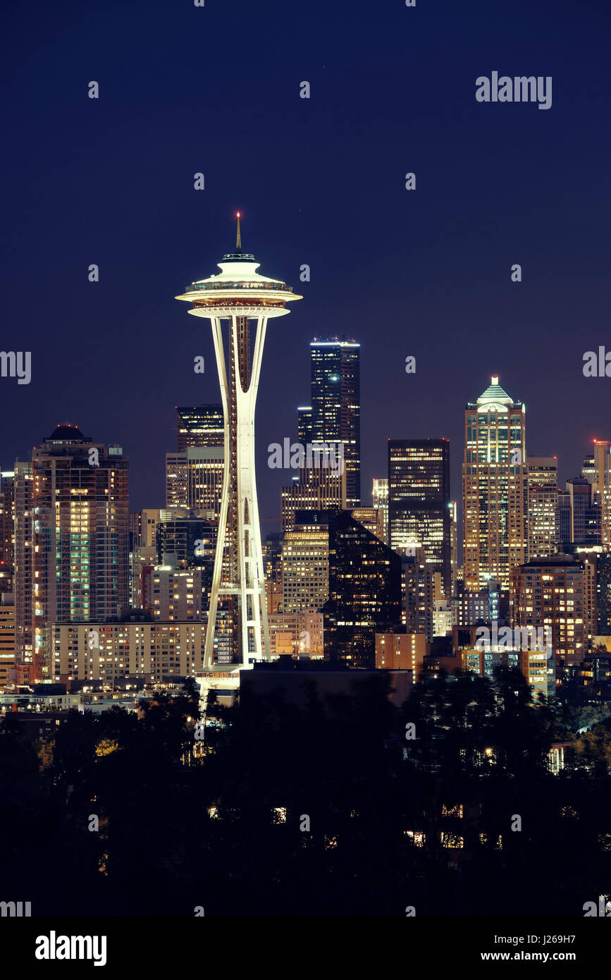 Seattle city skyline at night with urban office buildings viewed from ...