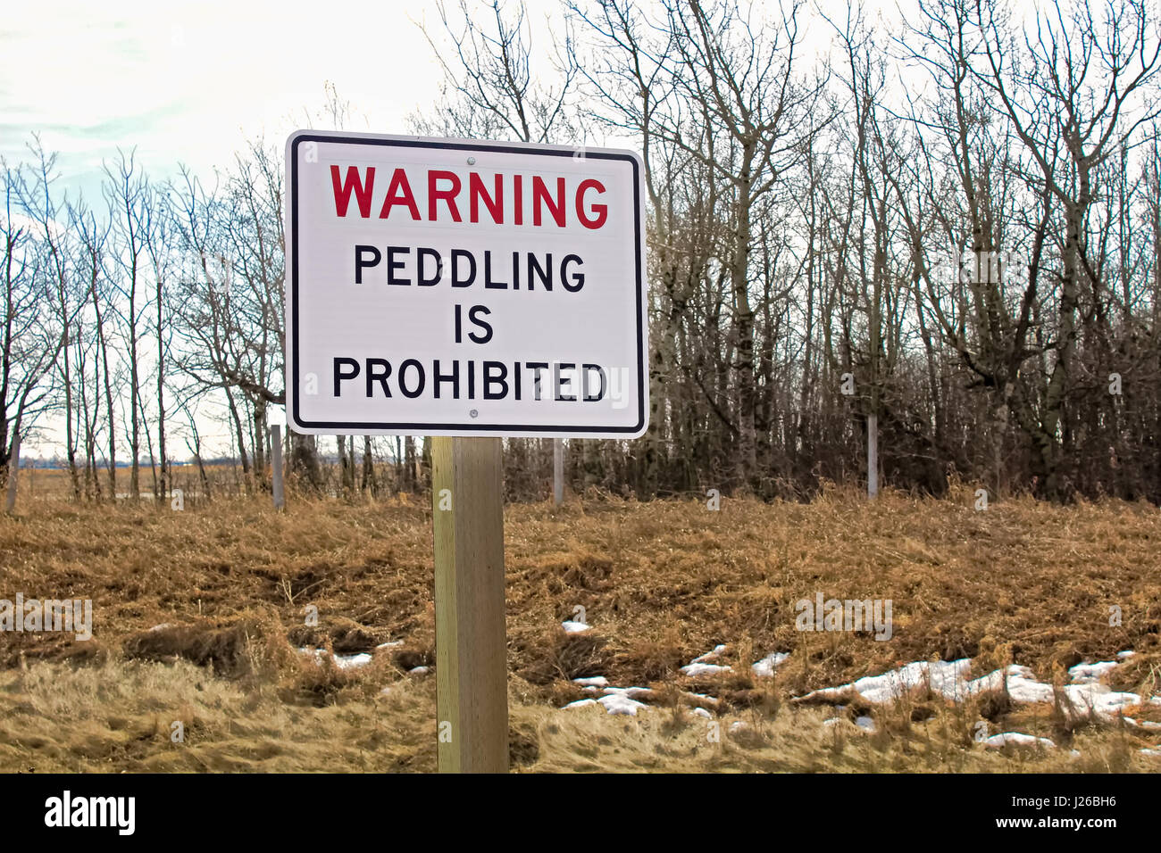 Warning peddling is prohibited sign. Stock Photo