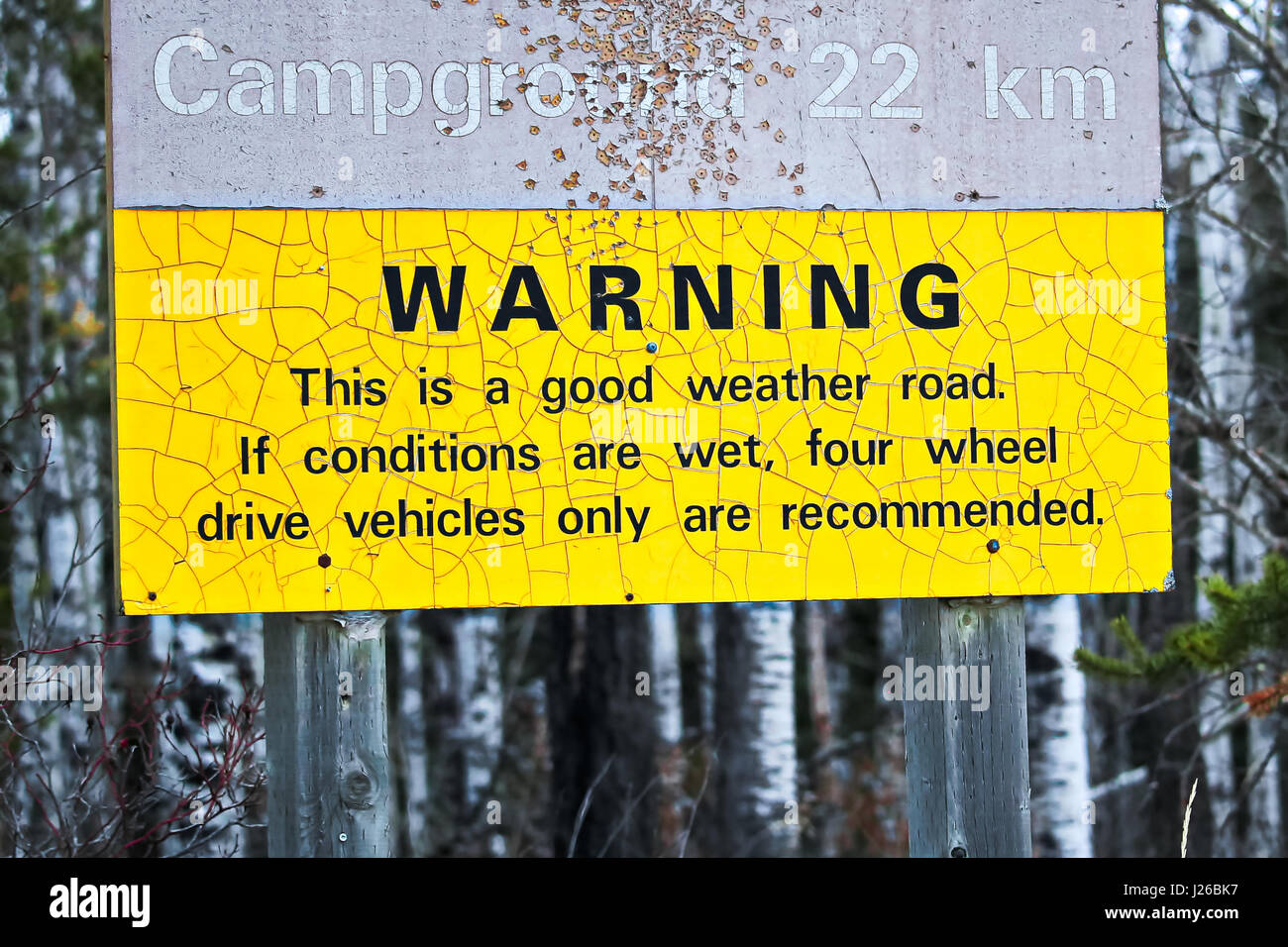 Warning about a rough road to campsite. Stock Photo