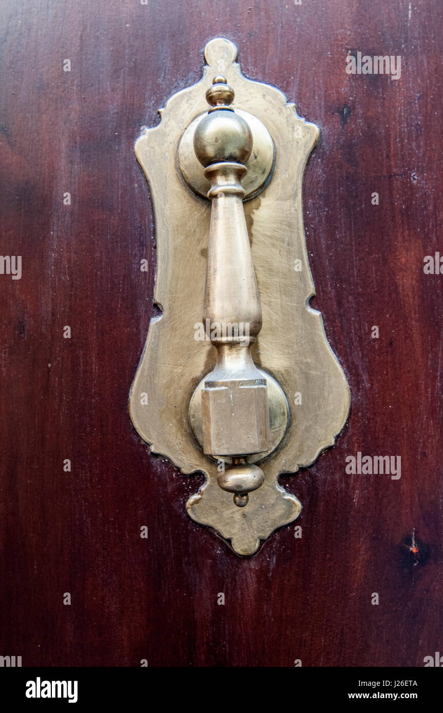 Brass hand door knocker hires stock photography and images Alamy