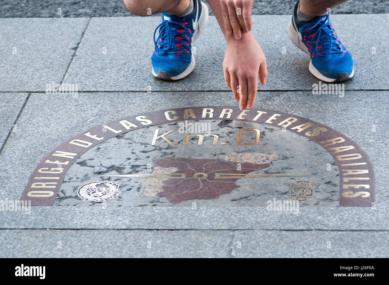 Madrid Kilometre Zero Km 0 stone indicating the geographical center of  Spain from which all six national roads are measured Stock Photo - Alamy