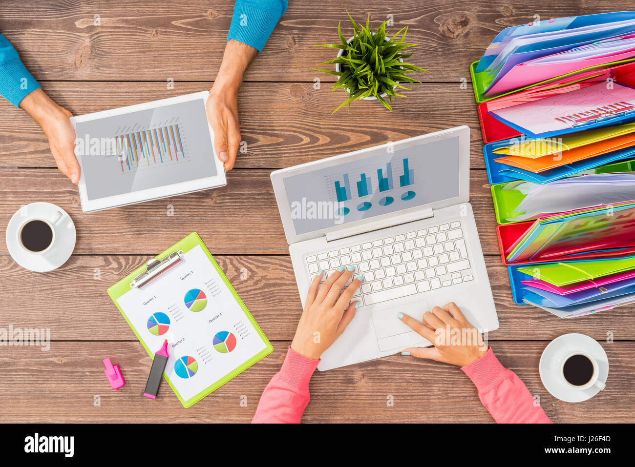 Man and woman working together on business project Stock Photo - Alamy