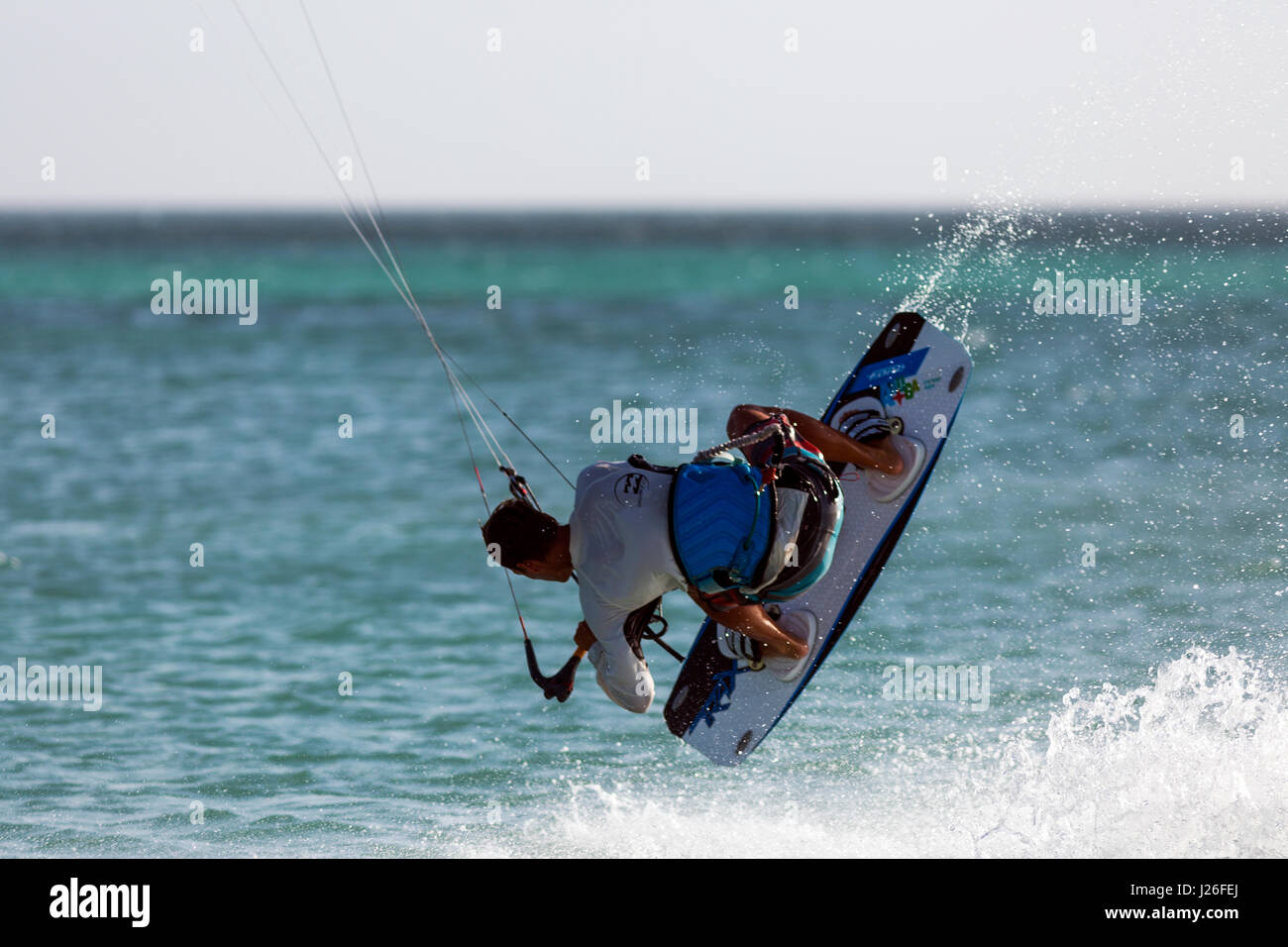 A parasailor on the waves of Hadicurari Beach, Aruba Stock Photo