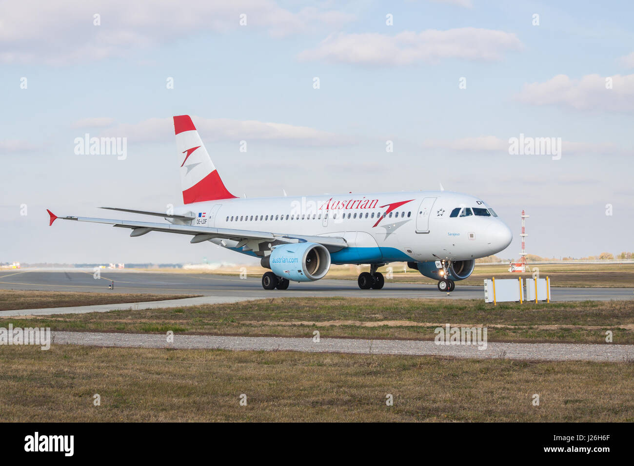 Borispol, Ukraine - October 23, 2011: Austrian Airlines Airbus A319-112 taxiing to the runway in the airport for takeoff on a cloudy autumn day Stock Photo