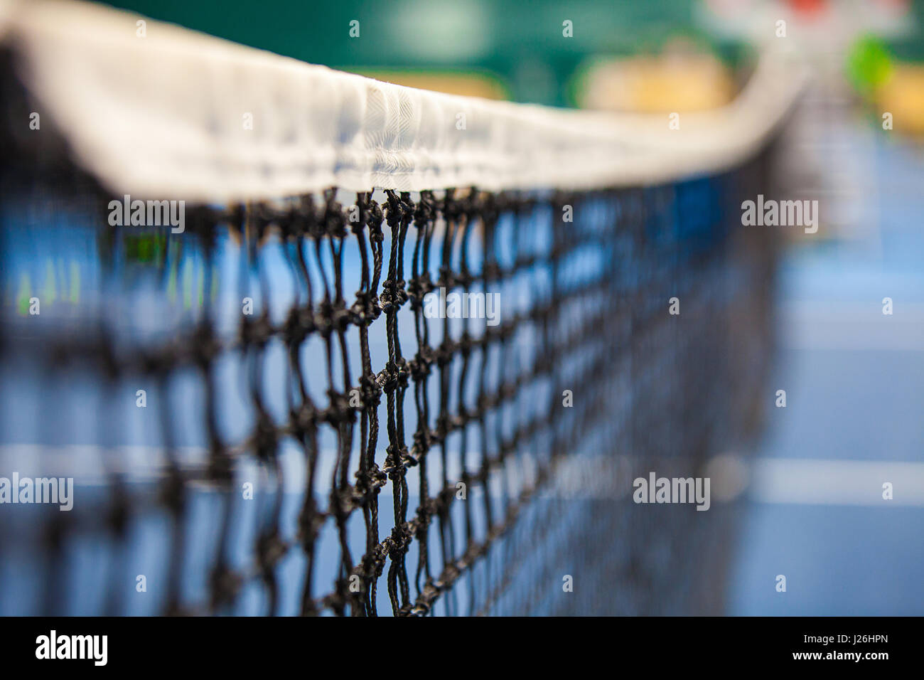Close up view of tennis court through the net Stock Photo Alamy
