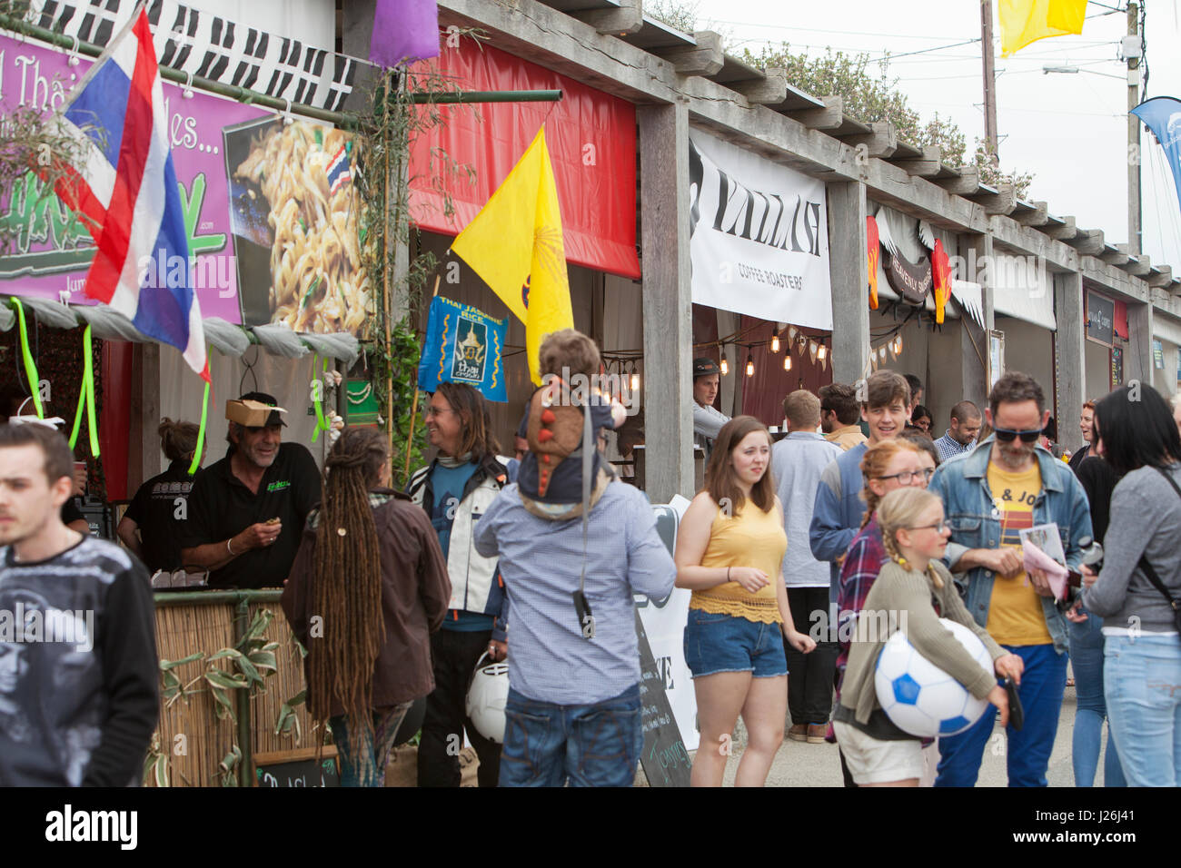 People browse the fast food outlets at Porthleven Food and Music