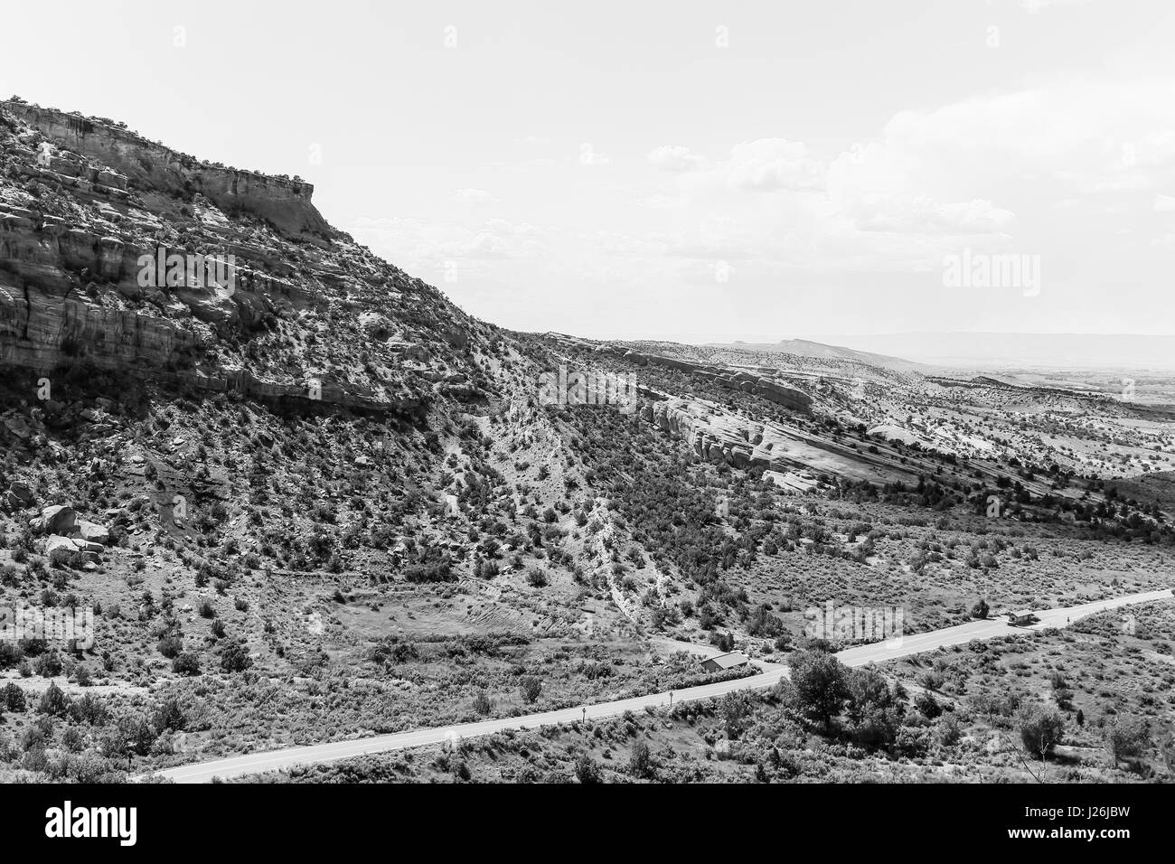 Grand Junction, USA - May 28, 2016: Entrance to the Colorado National Monument on the Rim Rock Drive seen from above. The picture is in monochrome. Stock Photo