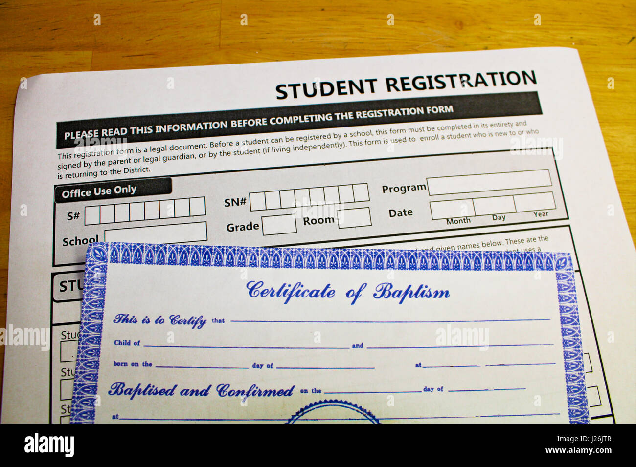 Proving faith in order to register in schools. Stock Photo