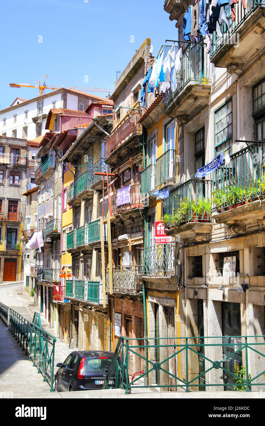 Porto, Portugal - May 13, 2012: Old street with colorful houses in downtown  of Porto Stock Photo - Alamy
