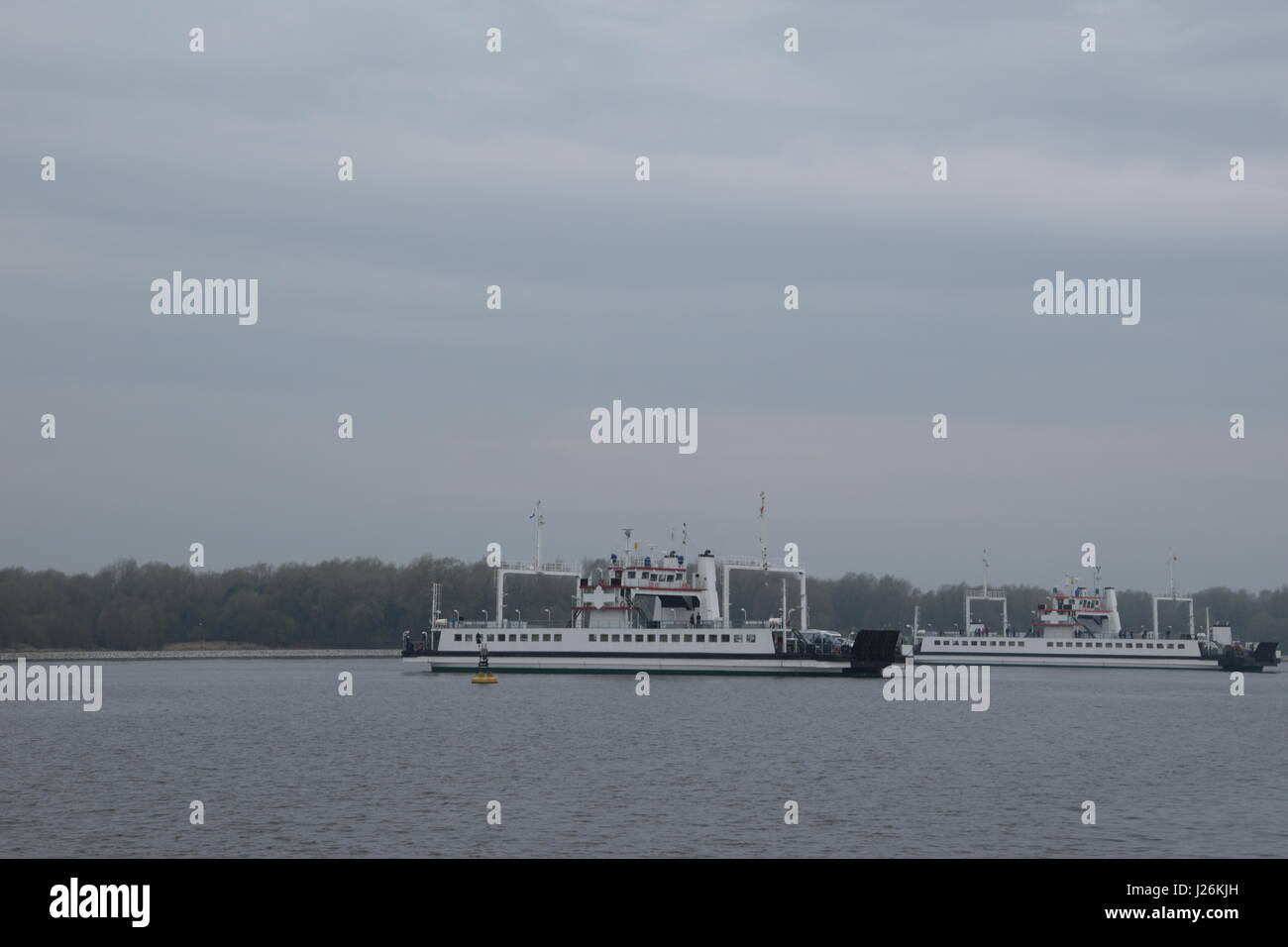 Car ferries across Swina river to Swinoujscie in Poland Stock Photo