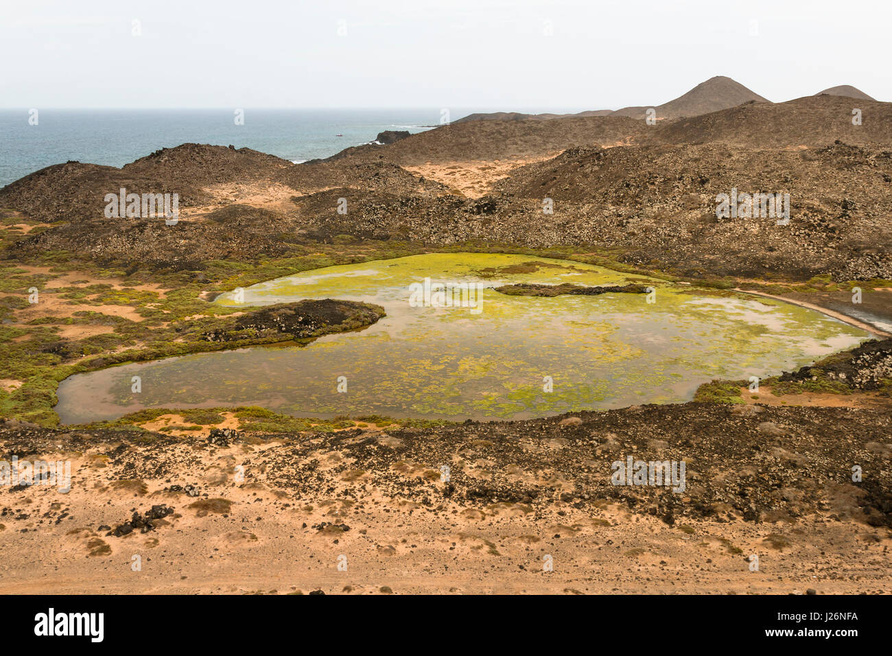 A small brackish water lake on the Isla de Lobos in Fuerteventura, Spain near Faro de Martino. Stock Photo