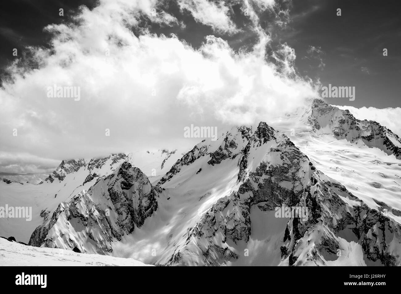 Black and white view on ski resort in snow winter. Caucasus Mountains ...