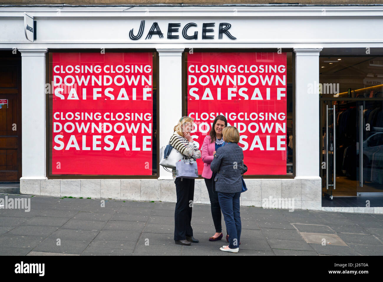 Closing Down Sale signs on a branch of Jaeger on the corner of  George Street and Hanover Street, Edinburgh, Scotland, UK. Stock Photo