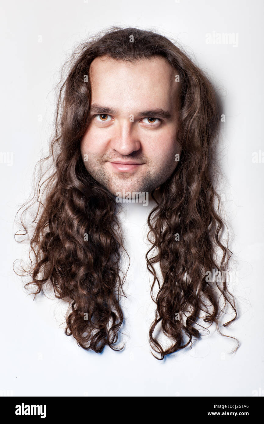 Funny men's head, hair with long curly hair. Close-up on a white background  head Stock Photo - Alamy