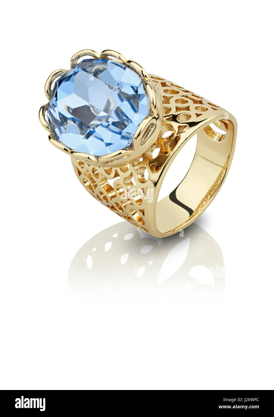 Golden ring whith big aquamarine isolated on white Stock Photo