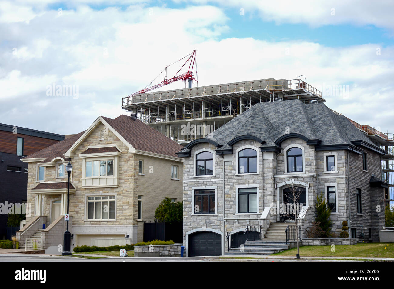 Living expensive homes and construction site in Montreal, Canada Stock