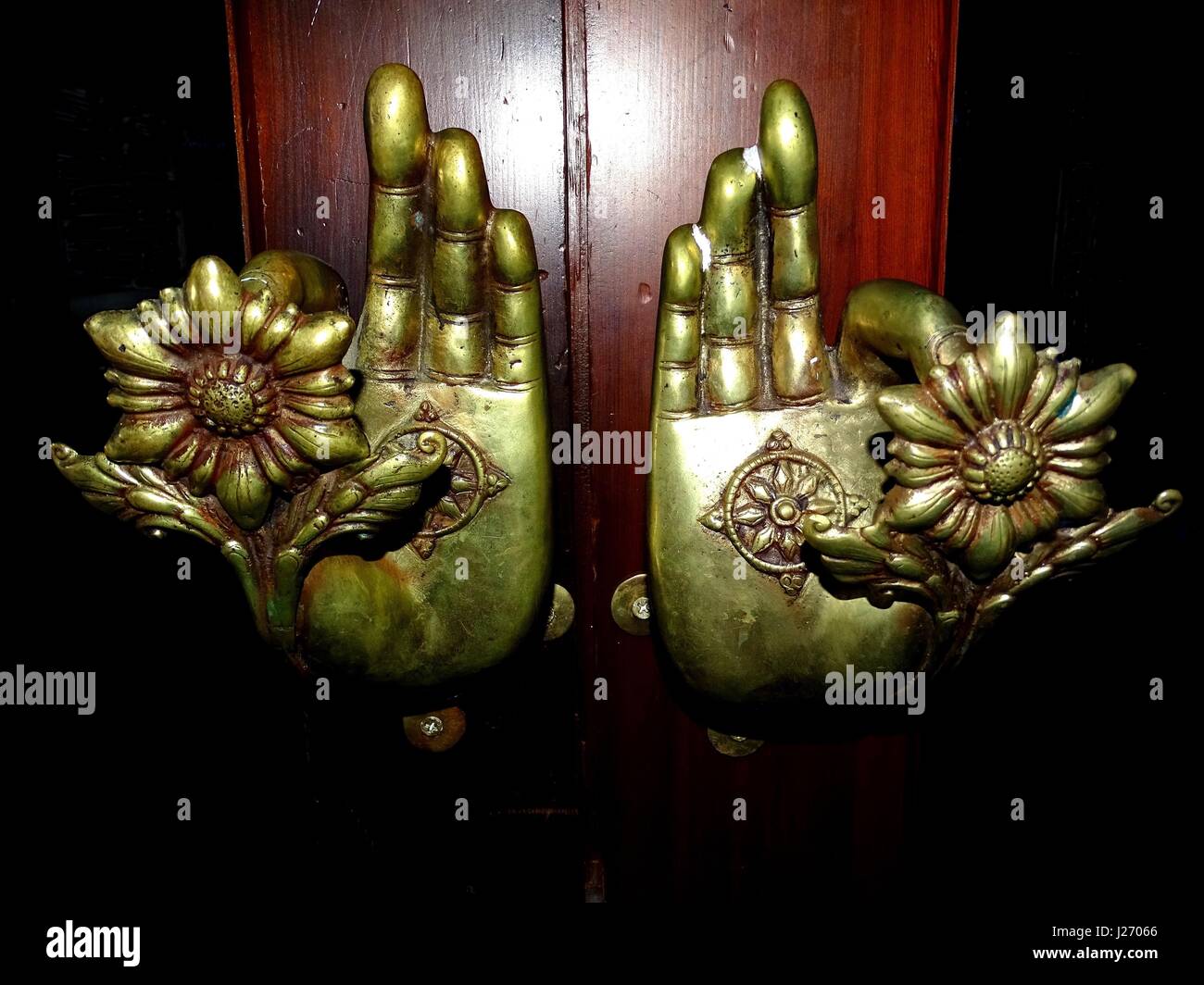 Thai style hand shaped door knobs Stock Photo Alamy