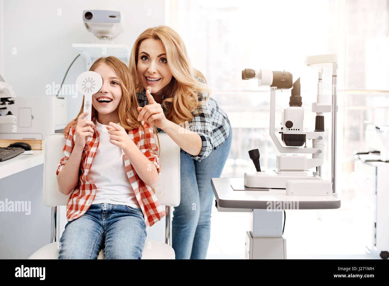 Emotional parent glad seeing her daughter healthy Stock Photo Alamy