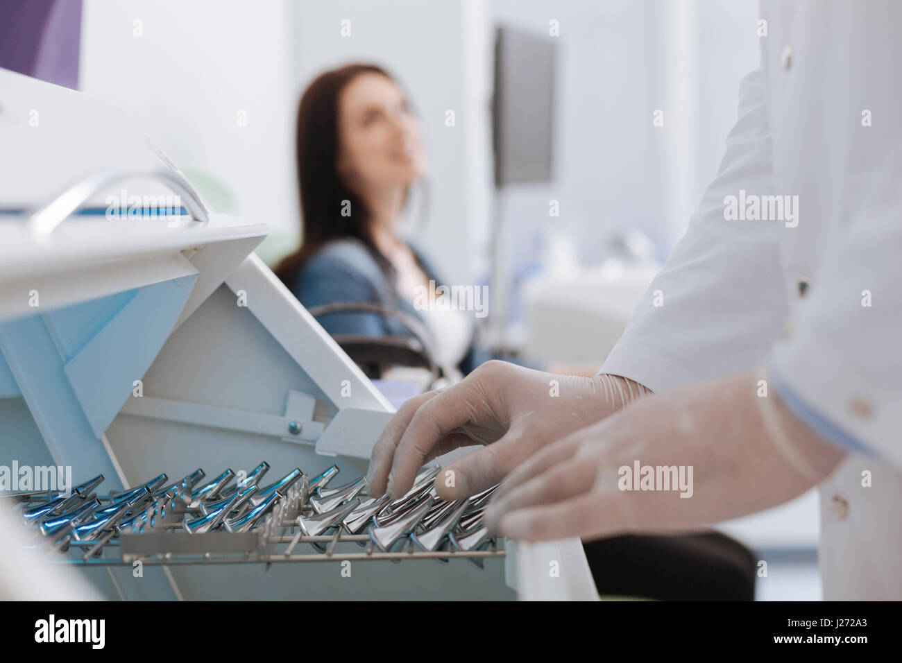 Medical worker choosing necessary instrument Stock Photo - Alamy