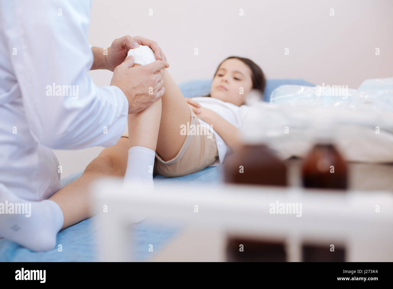 Professional male doctor giving the first aid Stock Photo - Alamy