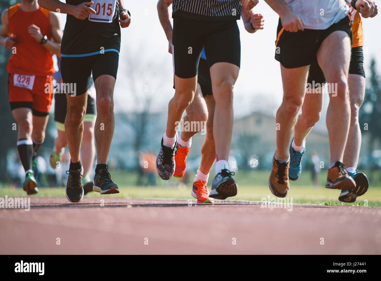 Group of marathon racers runningon the track Stock Photo Alamy