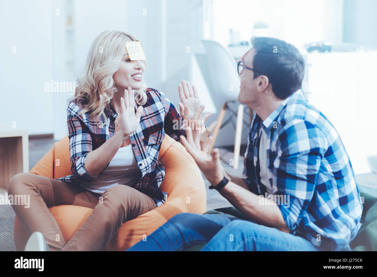 Cheerful delighted friends resting together Stock Photo