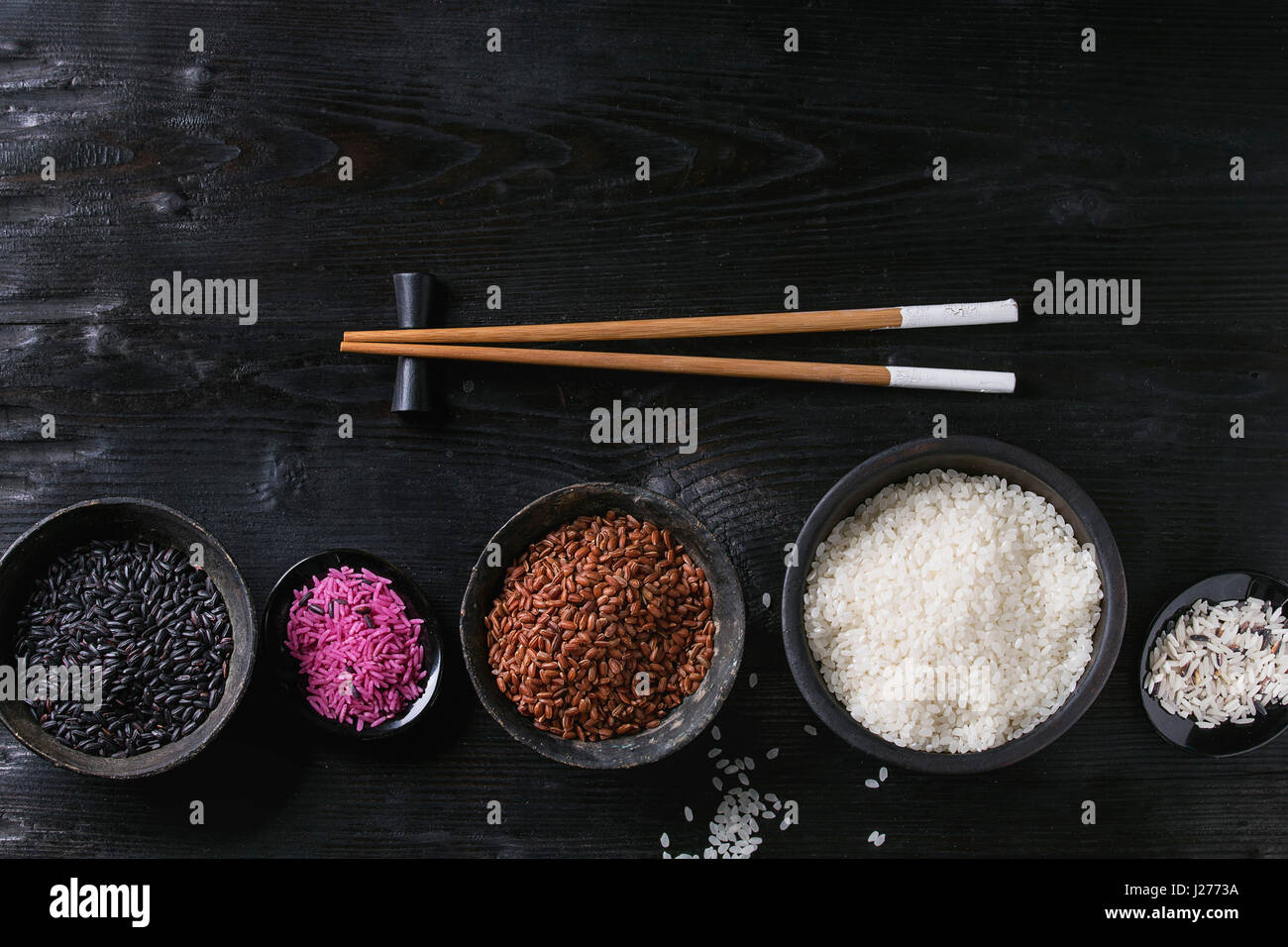Uncooked Colored Rice Bowls uncooked rice over white hi-res stock photography and images - Alamy