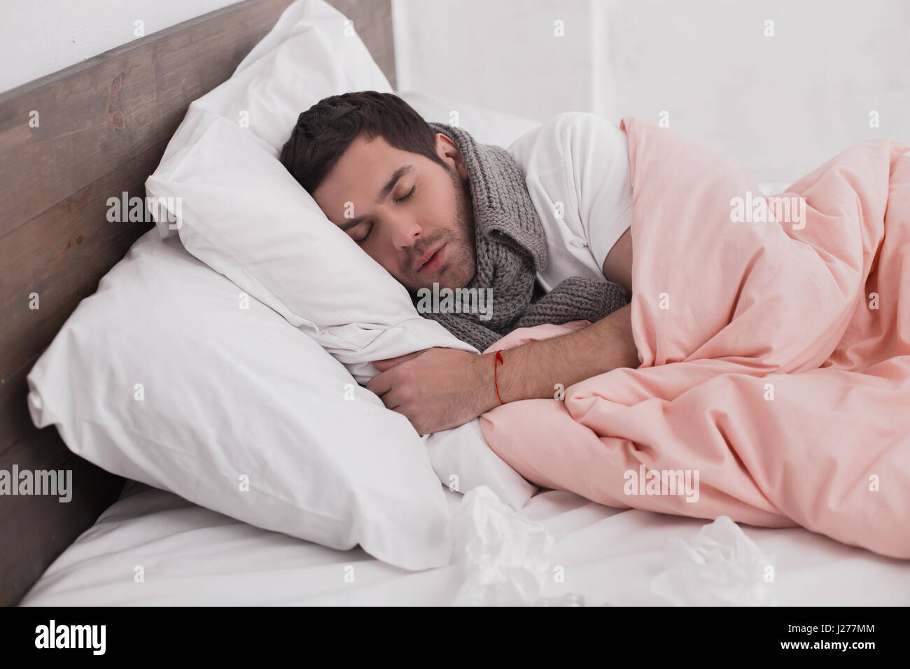 Sick young man sleep concept Stock Photo