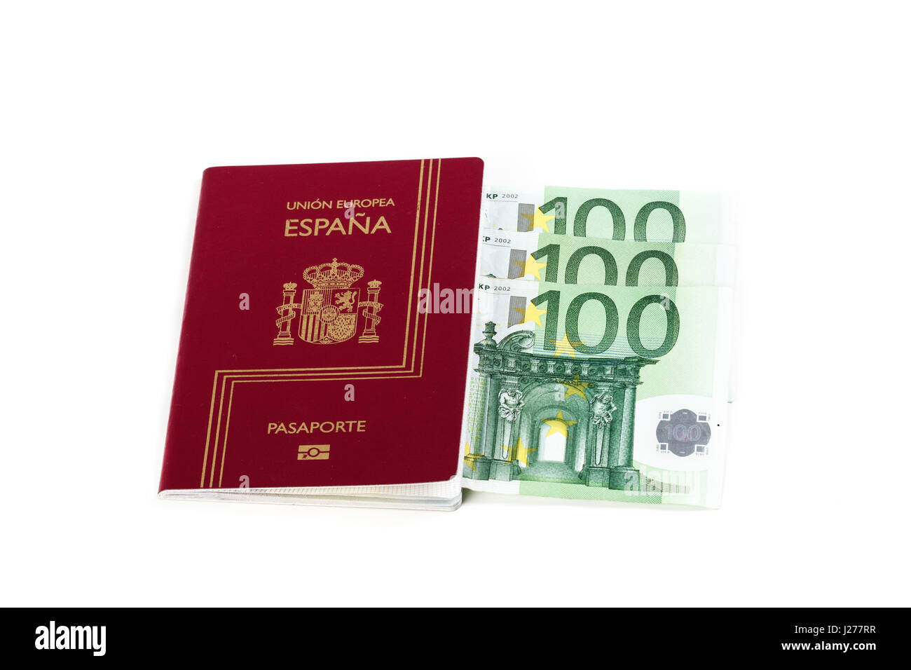 Spanish passport with european union currency banknotes on a white background Stock Photo