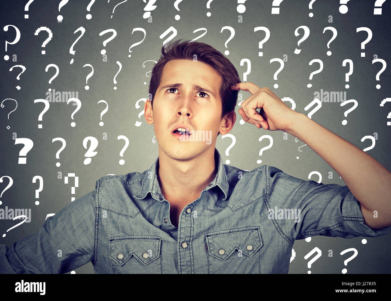 Thoughtful confused handsome man has too many questions and no answer