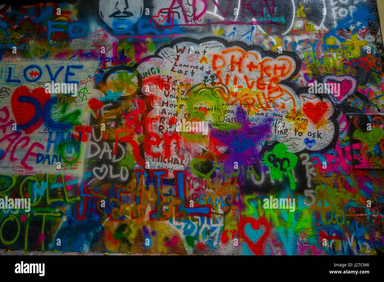 Prague, Czech Republic - 13 August, 2015: Famous John Lennon wall filled up with love inspired graffiti in city centre Stock Photo