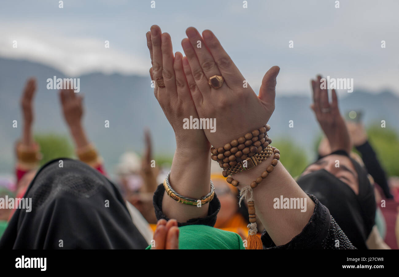Srinagar, Kashmir. 25th Apr, 2017. Kashmiri Muslim women pray as a head ...