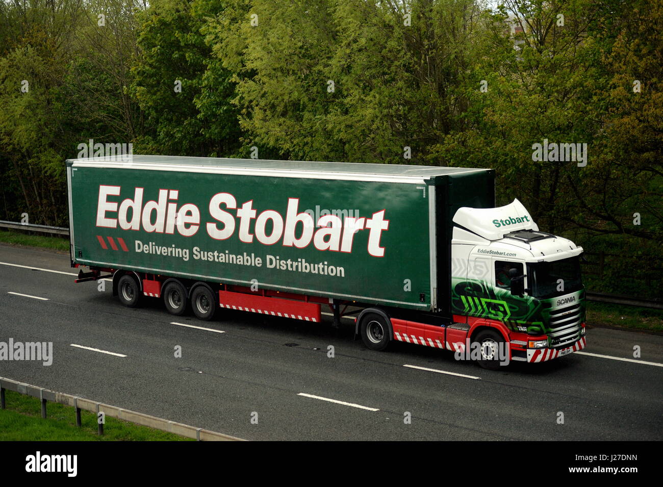London, UK. 25th Apr, 2017. Eddie Stobart Scania articualted truck. Eddie Stobart Logistics have today floated on the London Stock Exchange's junior market. Money raised from the initial public offering (IPO) will allow the famous trucking and logistics brand to pursue growth. Eddie Stobart started in Cumbria in the 1970's and is now a major pan european logistics player. A Scania tractor unit truck pulling an extra length curtainsided high capacity semi trailer: 25 April 2017   Credit: STUART WALKER/Alamy Live News Stock Photo